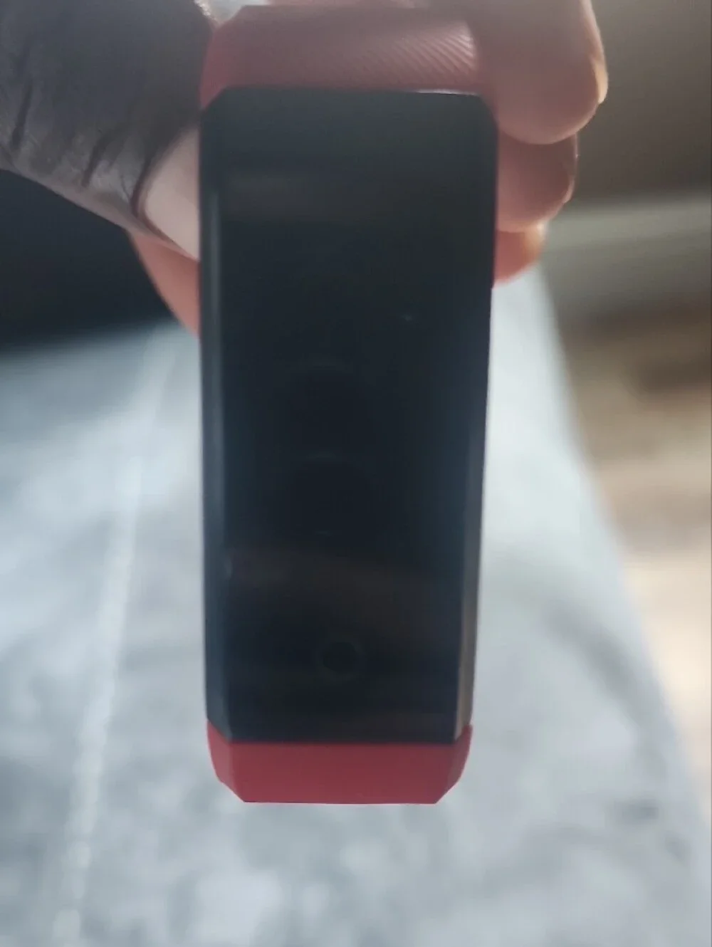 Red Fitness Tracker Wristband with Black Display